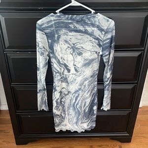 Long sleeve tie dye dress. Sheer, comes with slip under